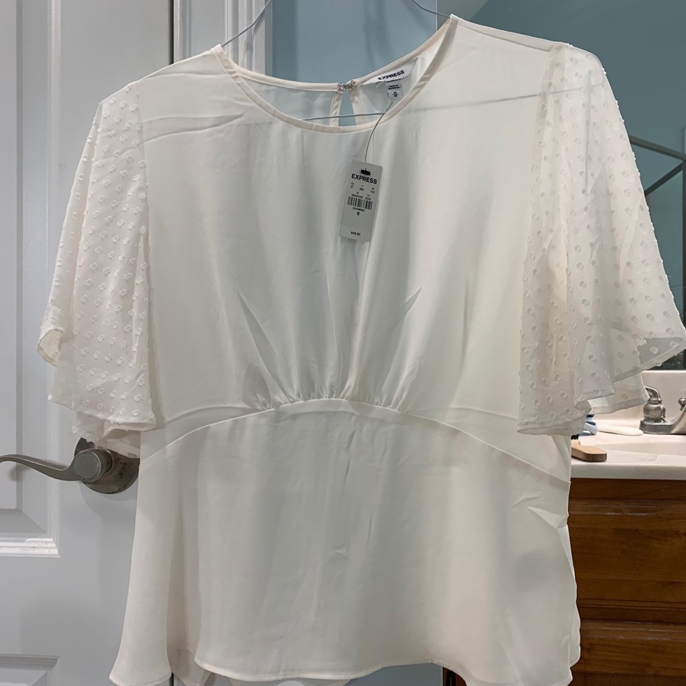 Express Peplum top. NWT
